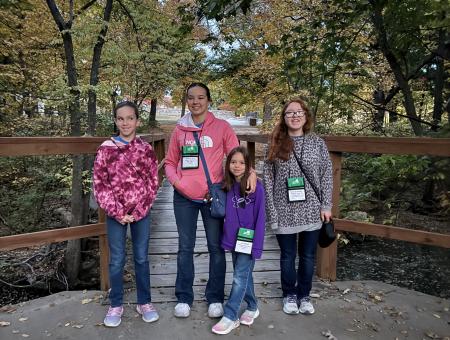 Julia, Lydia, Izzy and Hannah Walker are pictured at the 2023 Dog Conference. Julia, Lydia, and Hannah have all been Rock Springs 4-H Campers.